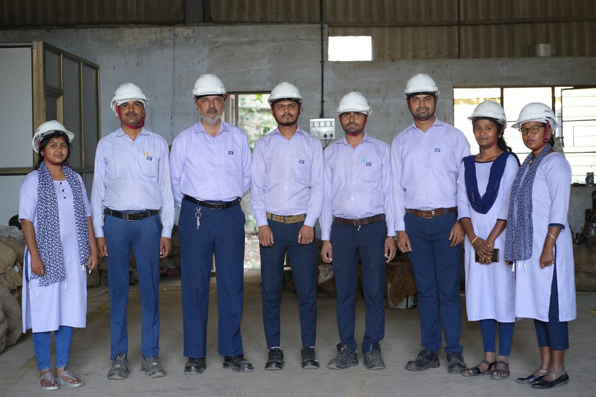 RIC office and quality team standing together in the warehouse