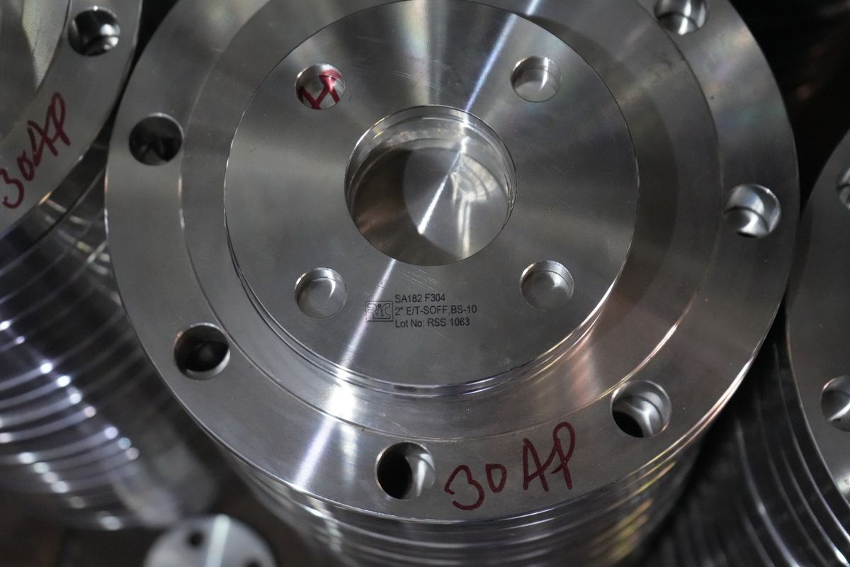 Stainless flange face stamped with ASTM grade, B16.5 and lot number